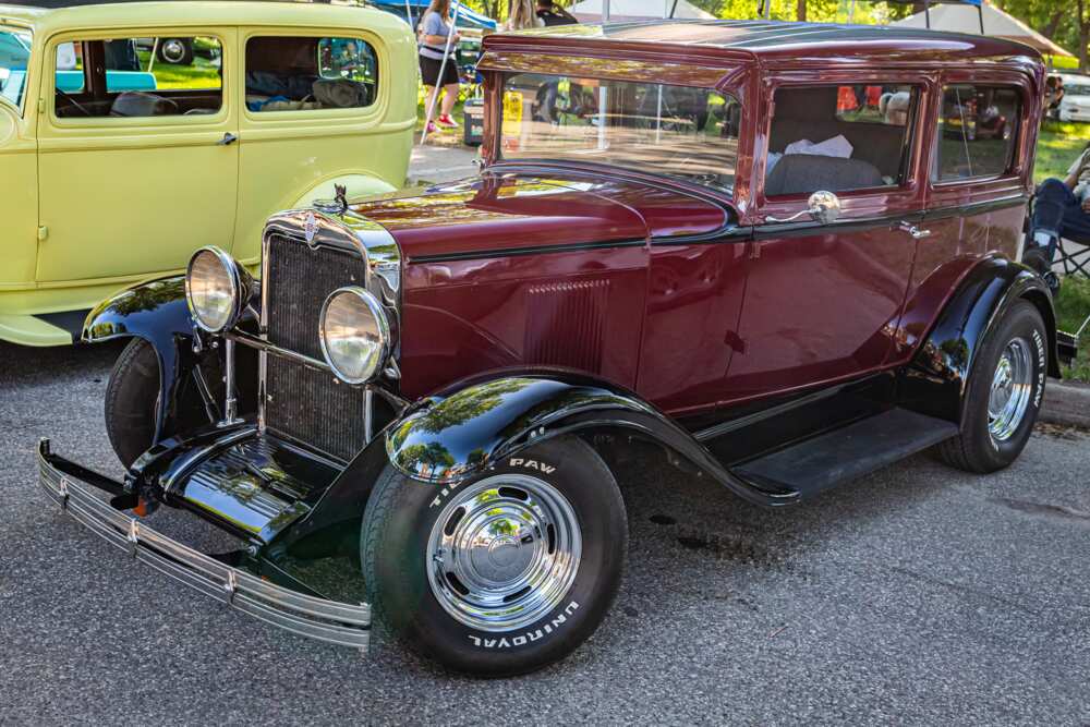 High perspective front corner view of a 1929 Chevrolet AC series international at a local car show.