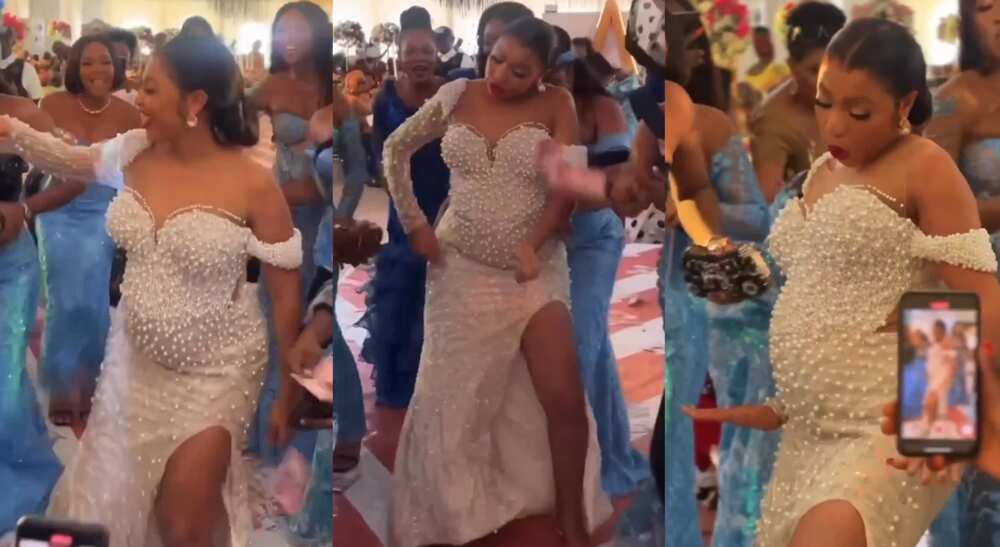 Photos of a pregnant bride dancing at her wedding.