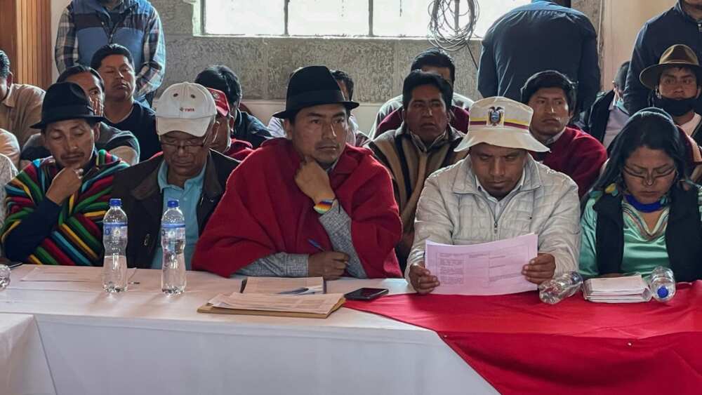 Indigenous leader Leonidas Iza (C) met with members of Ecuador's Parliament and Catholic Church for negotiations to end the latest standoff over the rising cost of living, but the government left the negotiations after a soldier was killed