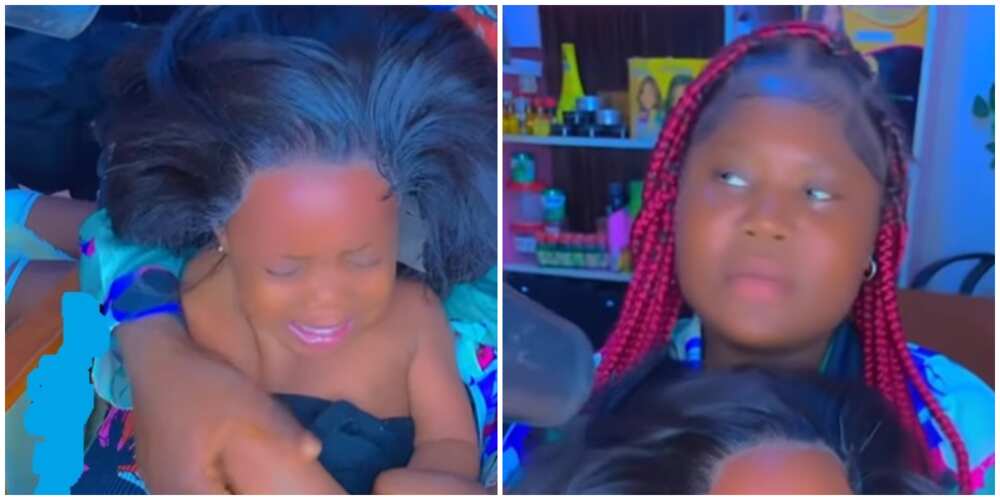 Video captures baby with lace frontal wig