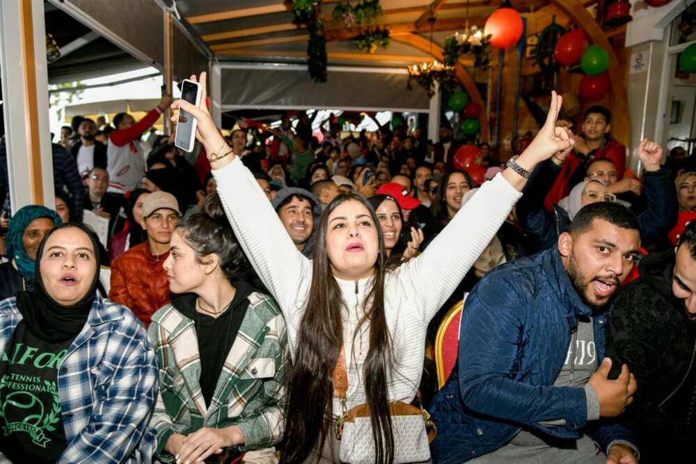 Fans in Rabat watch Morocco's 2-1 defeat of Canada which sent them into the World Cup second round for the first time in 36 years