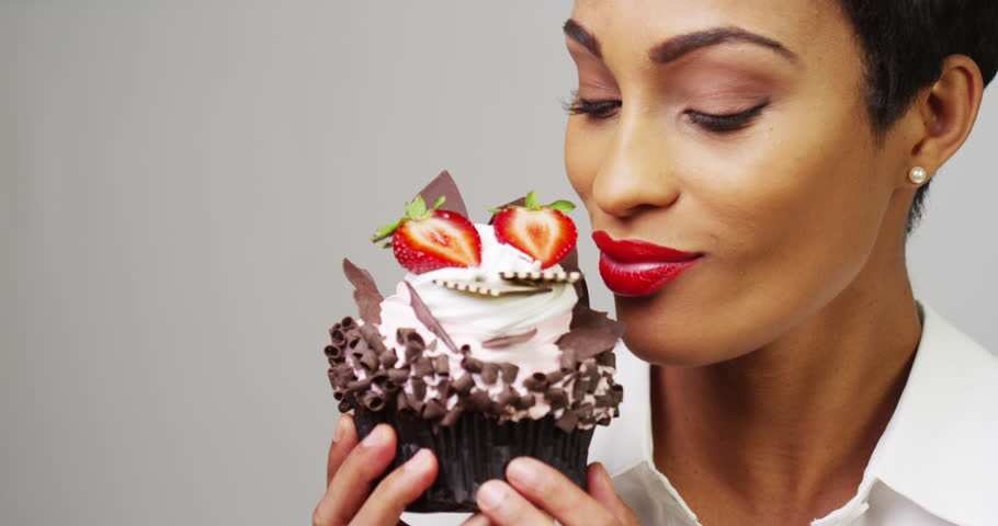 woman with cupcake