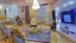 Emmanuel Emenike shows off multimillion naira living room with golden chairs, crystal lighting