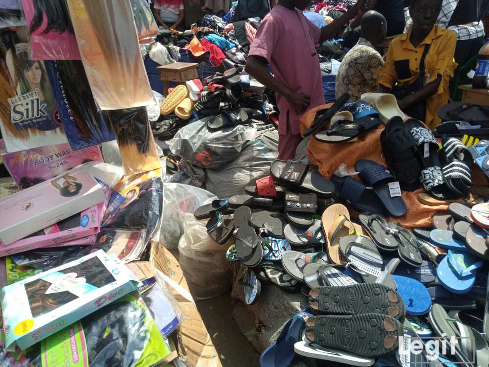 Hair extensions and slippers on display at a popular market in Lagos. Photo credit: Esther Odili