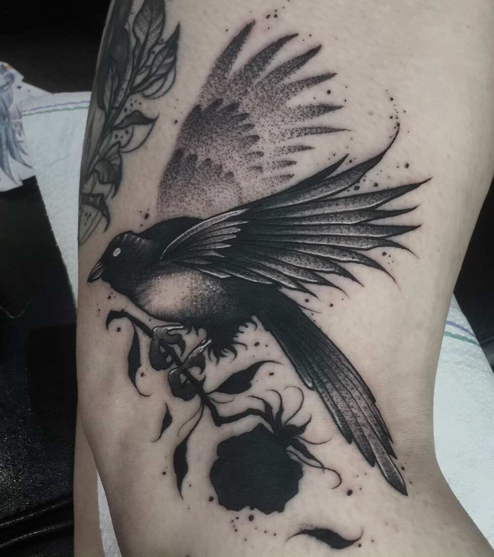 raven flying silhouette tattoo