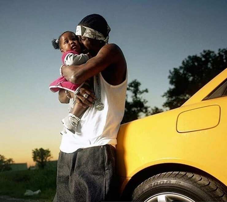 Lil Wayne with one of the four his children