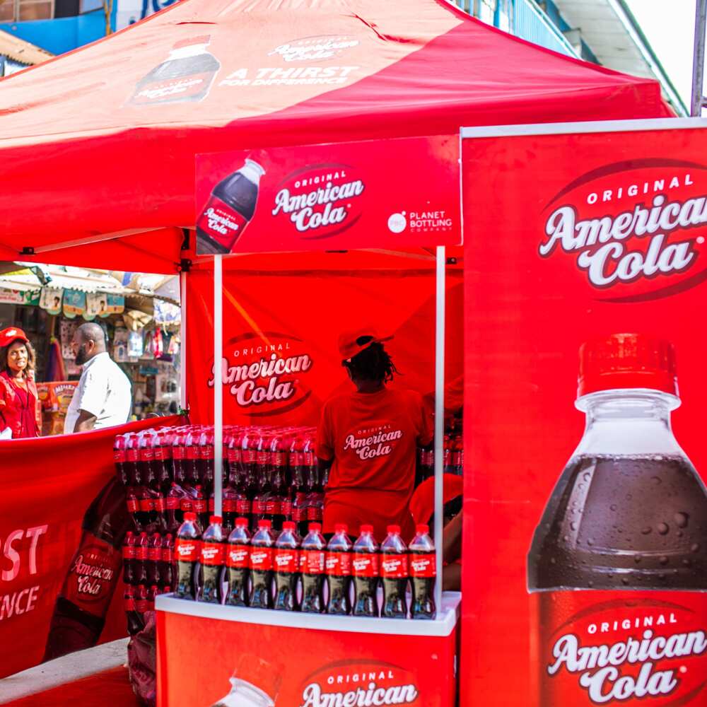 Introducing American Cola: The Bold and Refreshing New Product by Planet Bottling Company