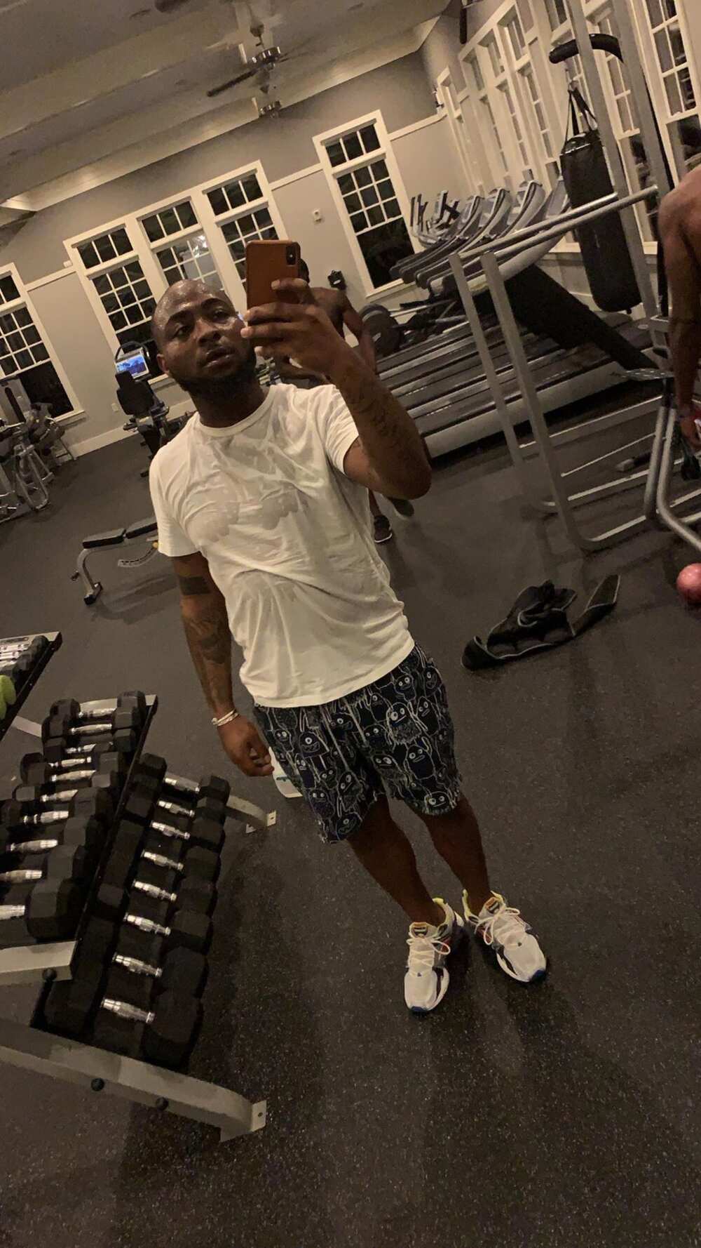 Davido works out hard to lose belly fat (photos)