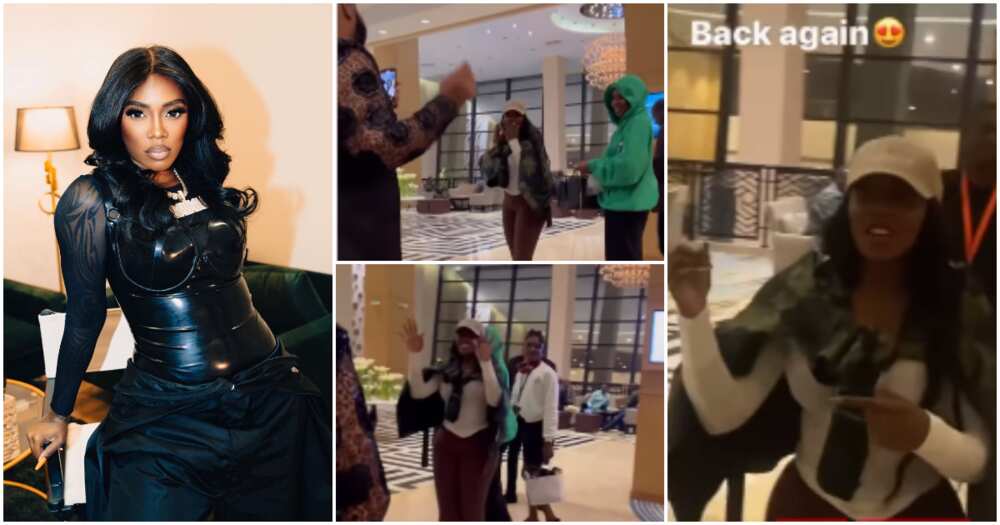 Fans sing for Tiwa Savage in hotel lobby.
