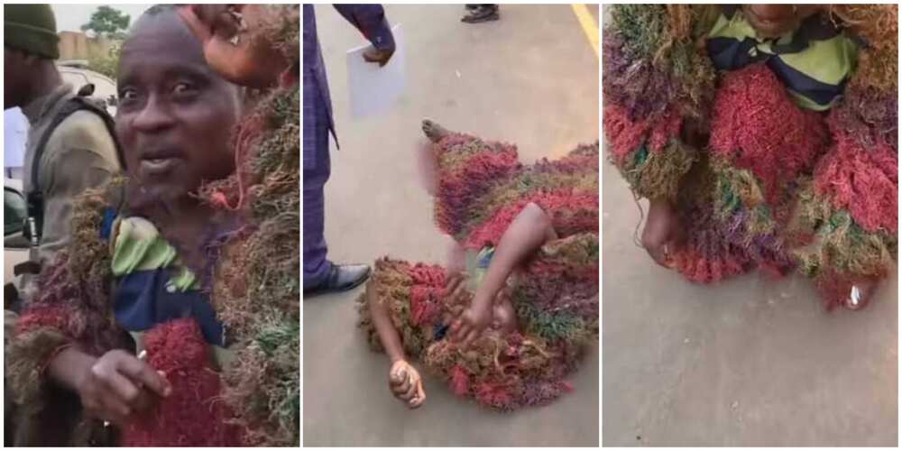 Video shows moment masquerade unmasked to beg for money on the streets of Owerri