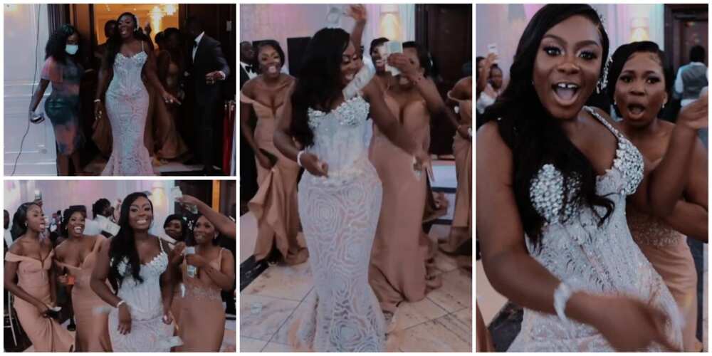 Bride makes majestic entrance into her wedding venue with bridesmaids raining cash on her in video