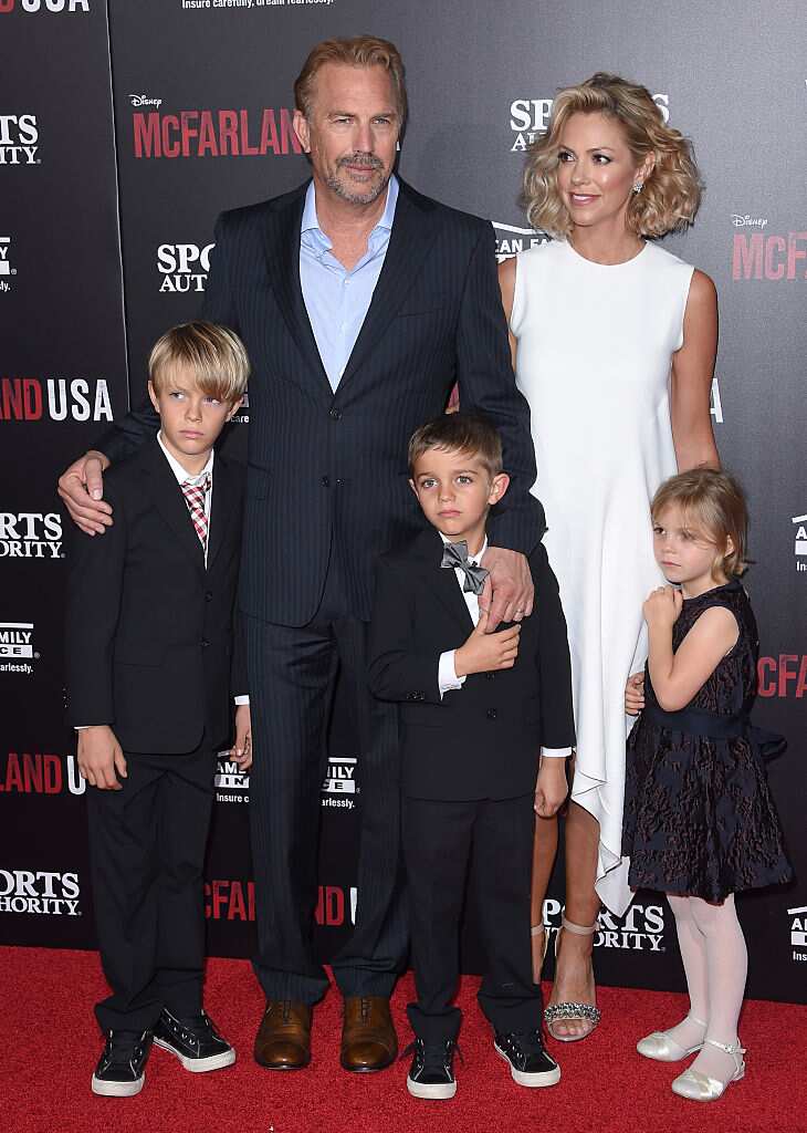 Kevin Costner, Christine Baumgartner and children Grace Avery Costner, Hayes Logan Costner and Cayden Wyatt Costner arrive at the World Premiere of Disney's 'McFarland, USA' on February 9, 2015 in Hollywood. (Photo by Axelle/Bauer-Griffin/FilmMagic)