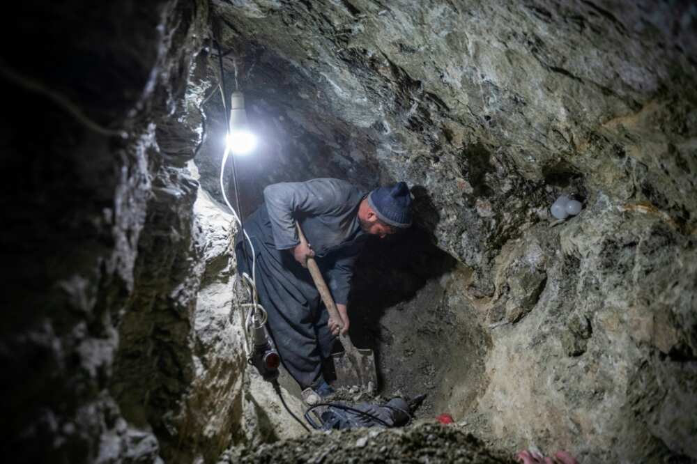 Mining in Afghanistan's mountains is dangerous work -- and can leave those attempting it mired in debt