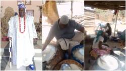 Nigerian king fries garri for community, markets it to people in video, his humility stirs reactions