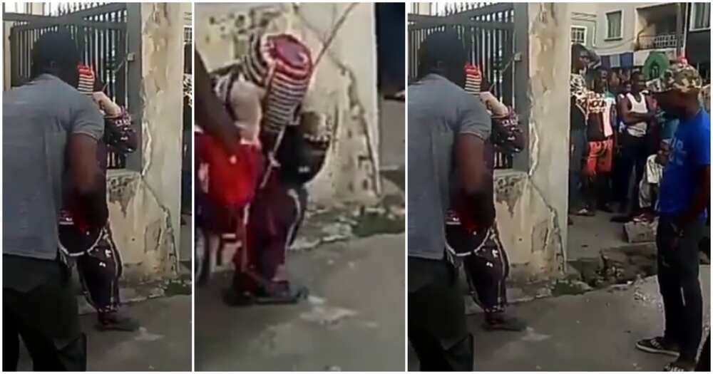 Nigerian soldiers punish masquerade who harassed people for money in Lagos (video)