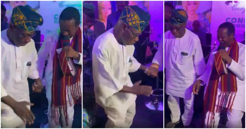 Obasanjo dancing with King Sunny Ade at event.