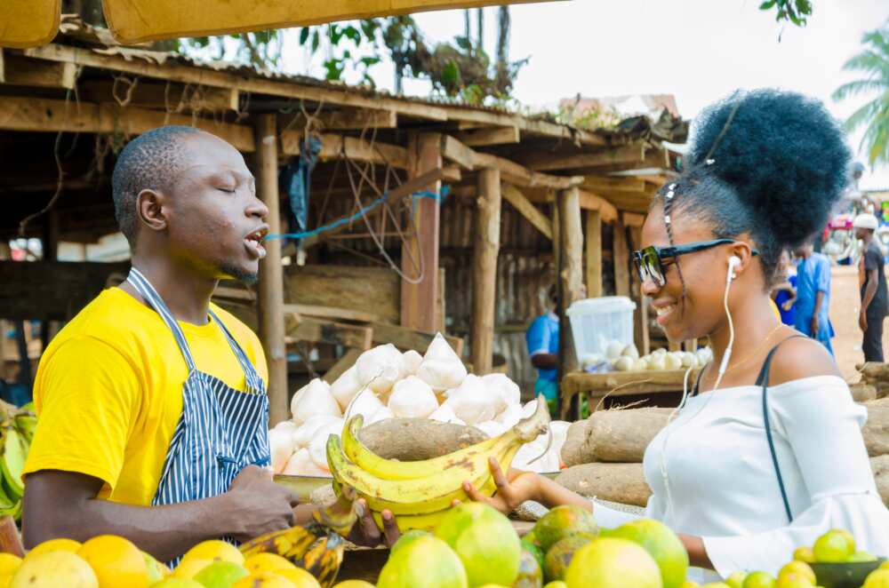 A Man Feeling Excited As He Sells To His Beautiful Customer