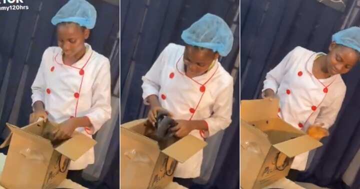 Chef Dammy receives carton of fish at cook-a-thon venue