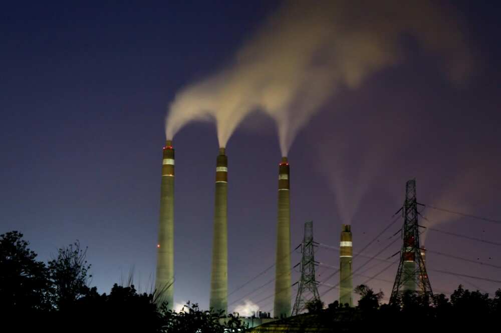 Smoke rises from the chimneys of the Suralaya coal-fired power plant in Cilegon on September 14, 2023