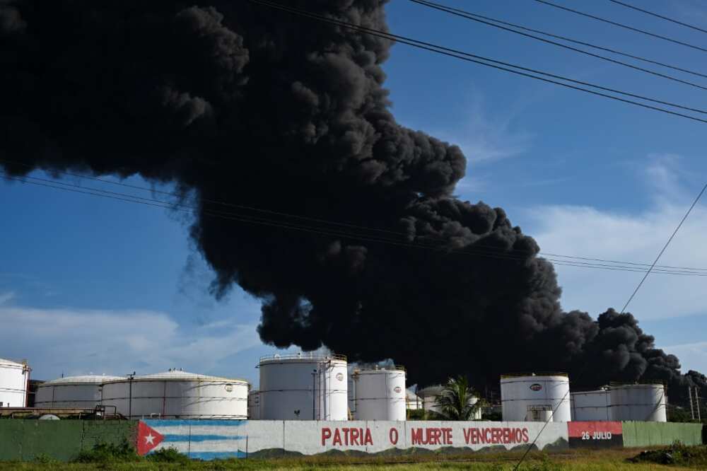 The fire broke out after a bolt of lightning struck a tank at the depot on the outskirts of Matanzas, a city of 140,000 people The fire broke out after a bolt of lightning struck a tank at the depot on the outskirts of Matanzas, a city of 140,000 people