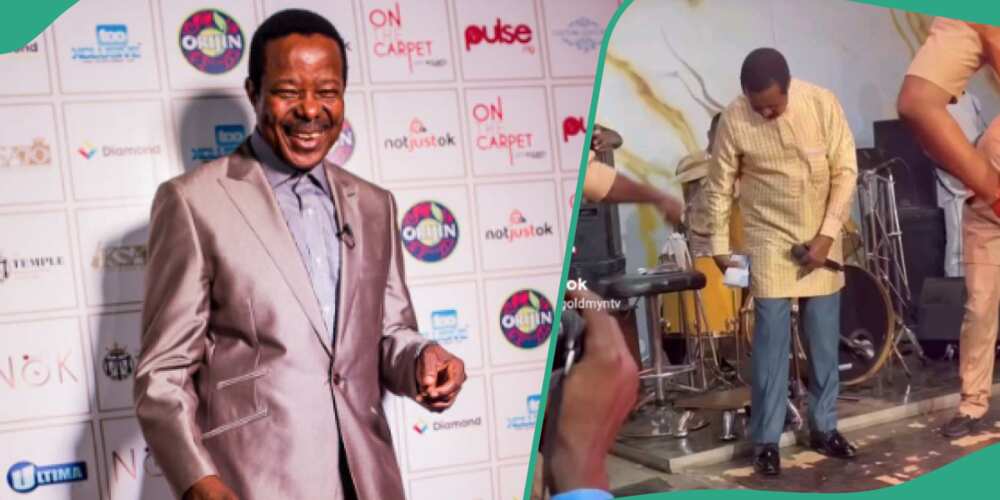 King Sunny Ade hides money in his trousers on stage.
