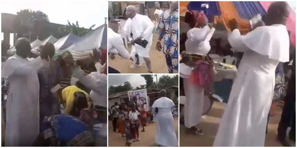 Nigerians react as Reverend father arrives burial in sneakers, sprays cash on people in video