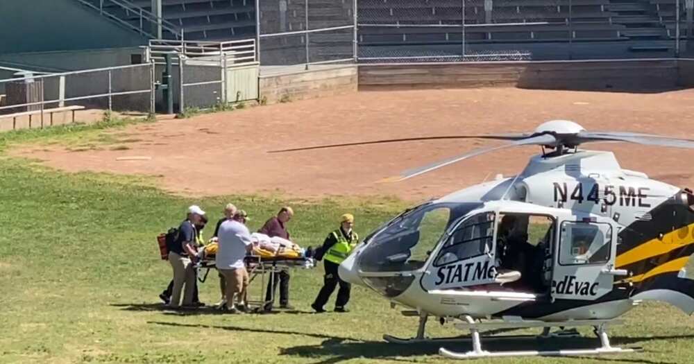 Salman Rushdie is loaded onto a medical evacuation helicopter near the Chautauqua Institution after being stabbed multiple times while speaking on stage in New York state