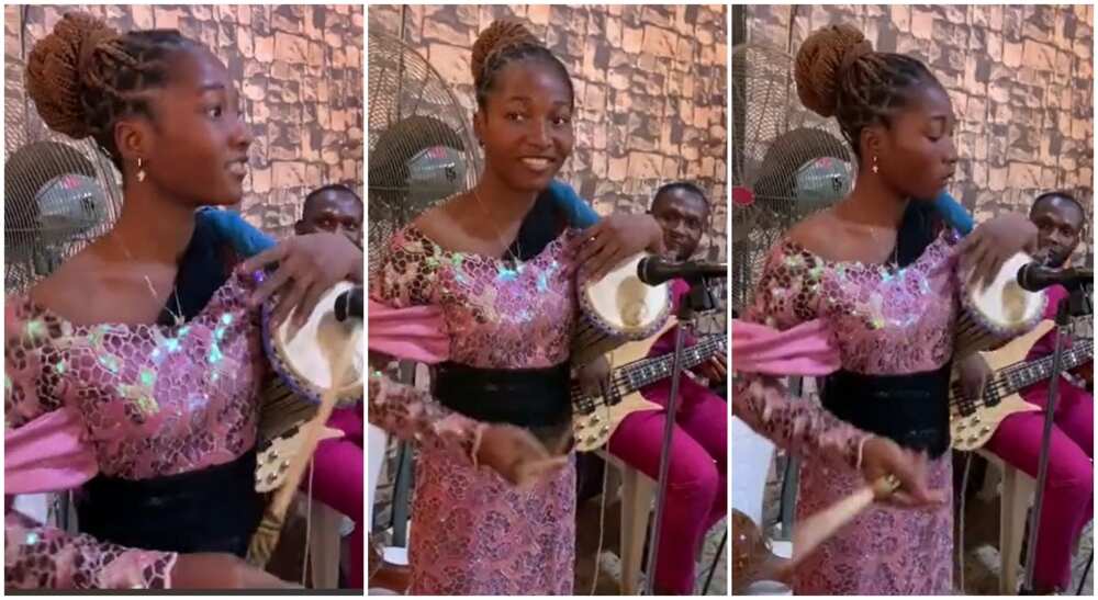 Photos of a Nigerian girl playing the Yoruba Talking Drum.