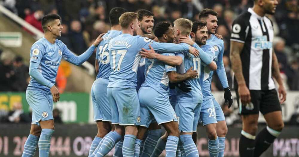 Man City players celebrate after scoring against Newcastle. Photo: Getty Images.