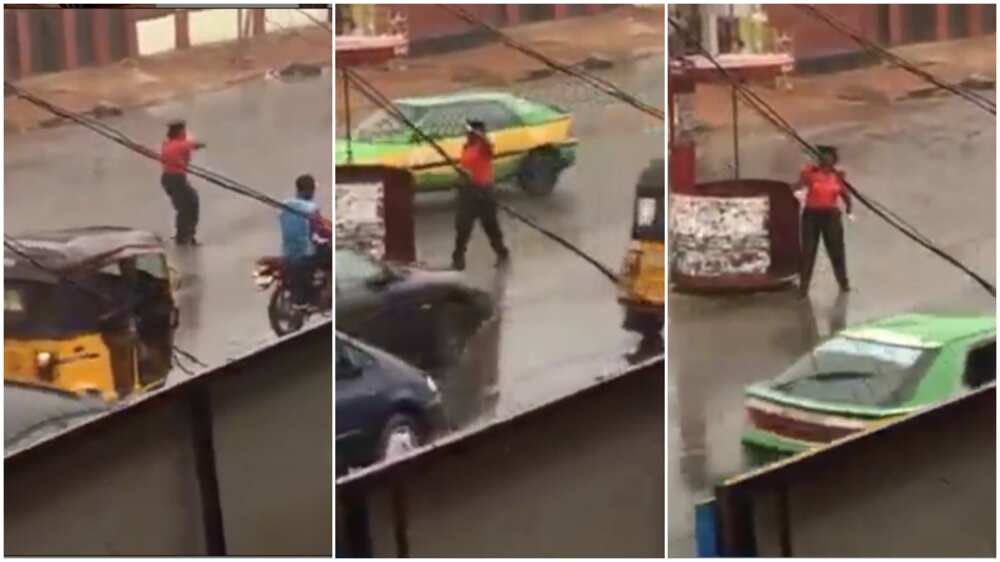 Heartwarming Moment Female Officer Controls Traffic under Heavy Rain in Kwara state, her Video Goes Viral