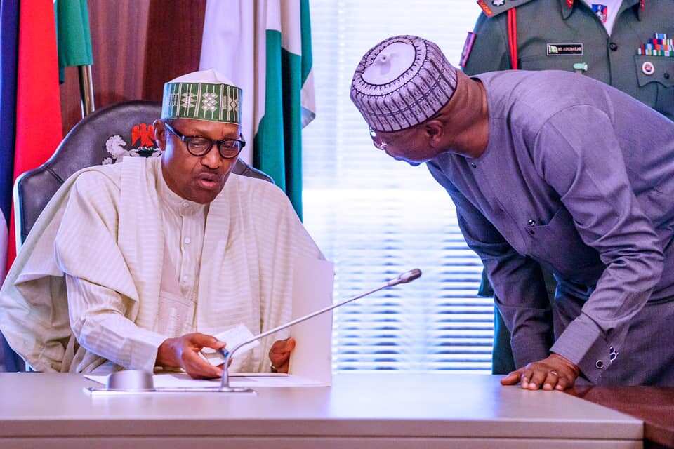 Shugaban kasa Muhammadu Buhari tare da sakataren gwamnatin tarayya; Boss Mustapha