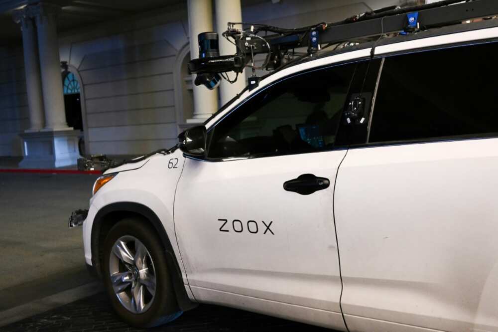 A Toyota sport-utility vehicle modified by Zoox, a subsidiary of Amazon.com, which combines radars, lidar, and cameras to test its software, drives on a road ahead