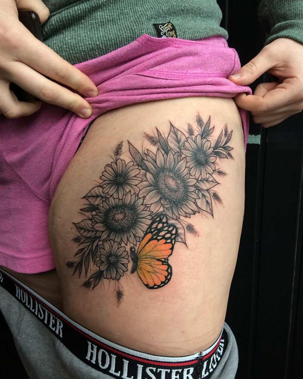 Sexy Sunflower and butterfly thigh tattoo