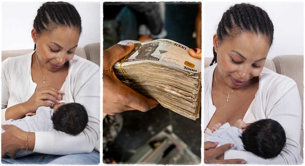 Woman looking at phone while holding baby. Woman looking at phone while holding baby.