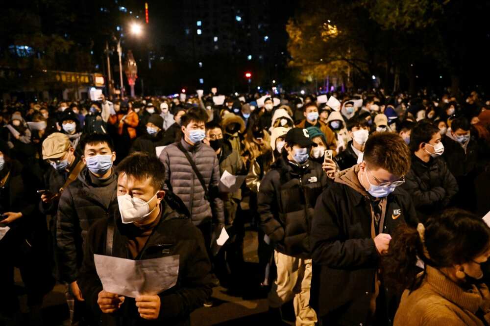 People took to the streets in major cities across China in a wave of protests not seen since pro-democracy rallies in 1989