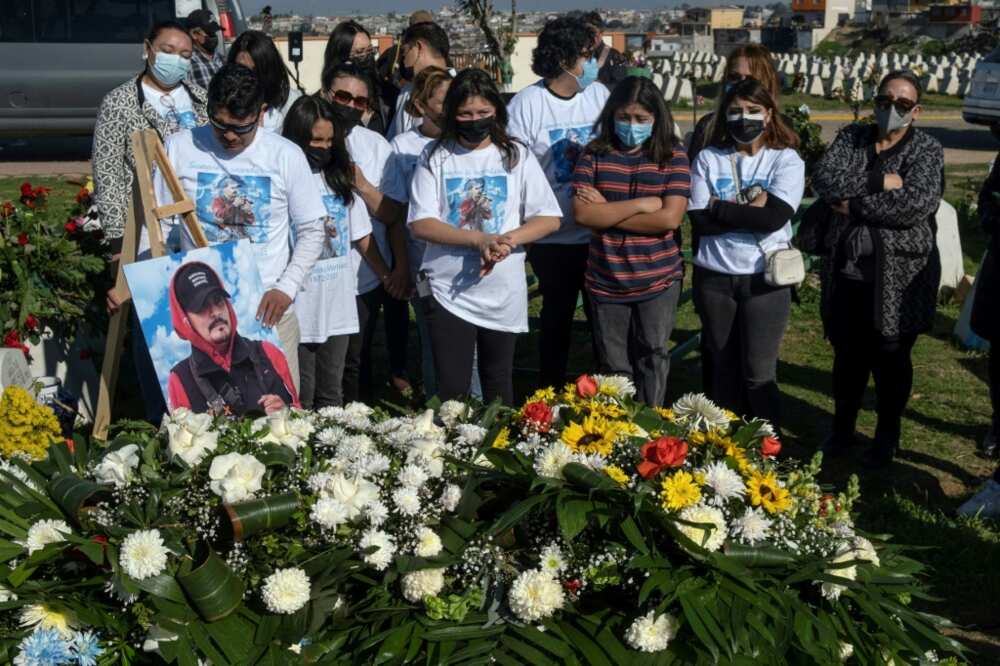 Relatives and friends mourn photojournalist Margarito Martinez, who was murdered in January 2022 in the Mexican border city of Tijuana
