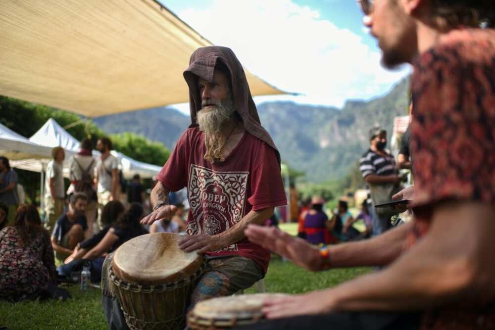 Men play drums at an organic market in Tepoztlan, Mexico