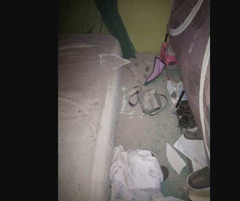 Lady, baby escaped alive as block crashes through roof of her bedroom ceiling while sleeping (photos)