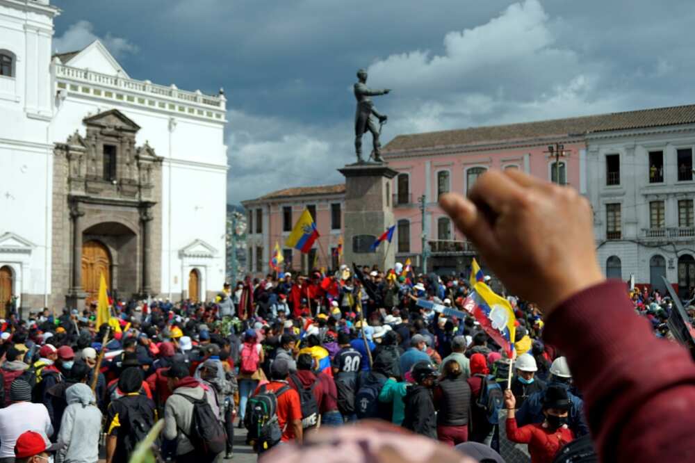 Indigenous people march in downtown Quito on June 22, 2022, on the tenth day of protests against the Ecuadorean government