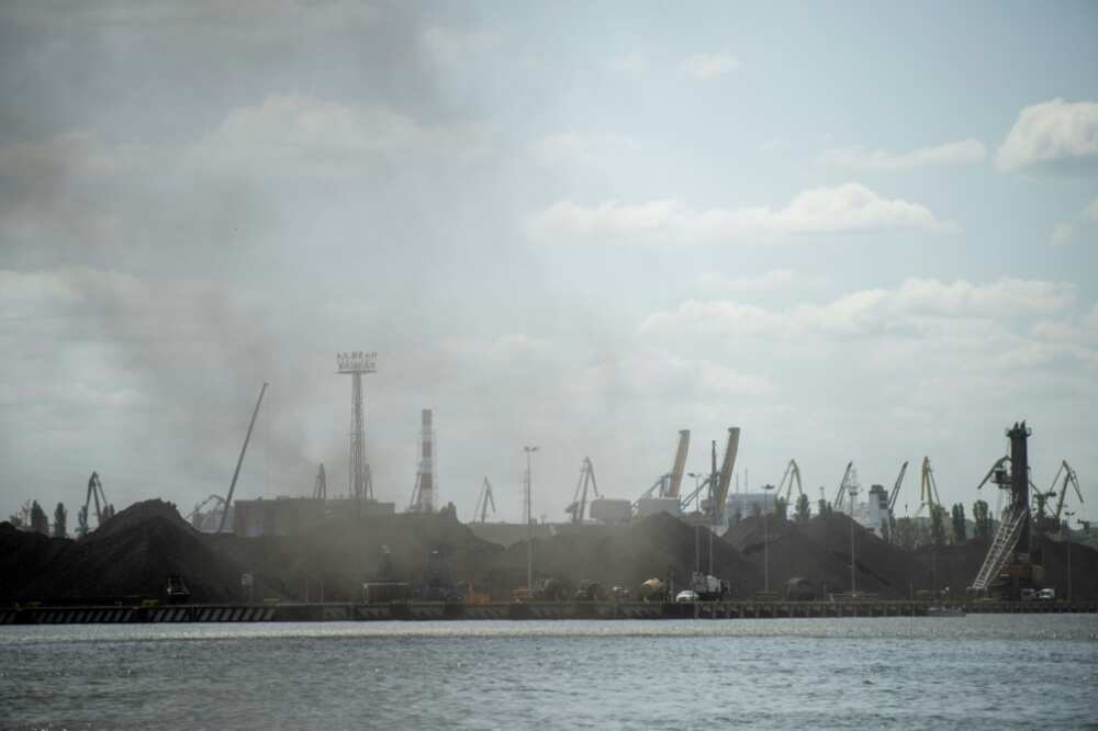A large cloud of coal dust hanging over the port of Gdansk, Poland
