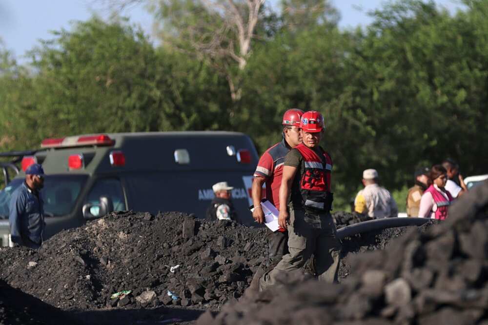 Rescue personnel work at a coal mine in northern Mexico where around nine people were believed to be trapped