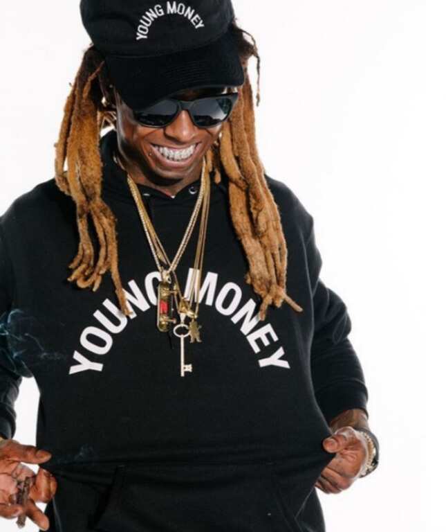 Lil Wayne in own clothes with the Young Money logo