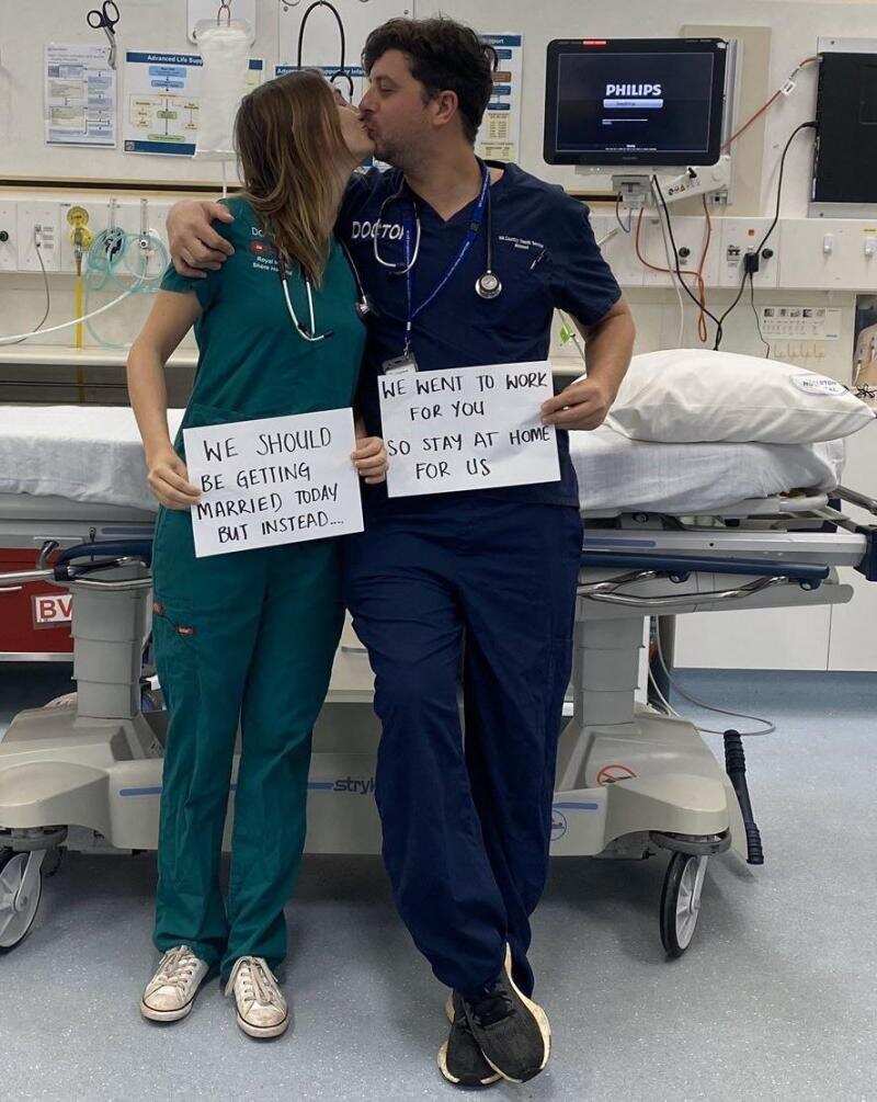 The picture of the couple in their hospital uniform as they went back to work. Photo source: LinkedIn
