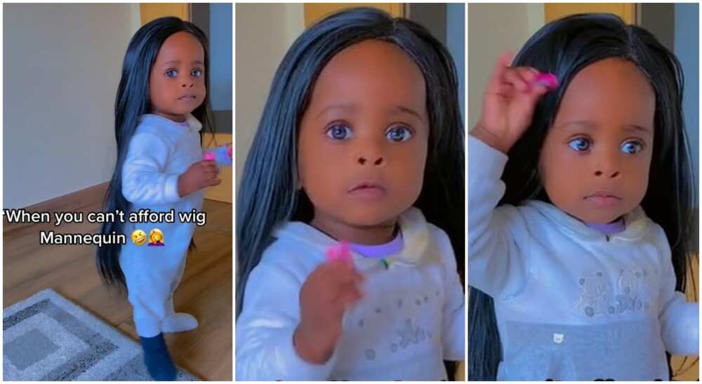 Photos of a little girl wearing her mother's black wig.