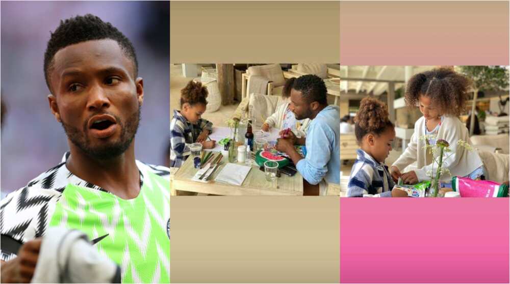 Super Eagles Legend on Daddy Duties As He’s Spotted Assisting His Twin Girls With Their Assignments