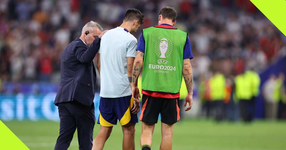 Security guard accidentally collides with Morata during Spain's post-game celebration against France - video