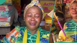 Young man gives mother heartfelt birthday celebration at her shop, sprays naira notes