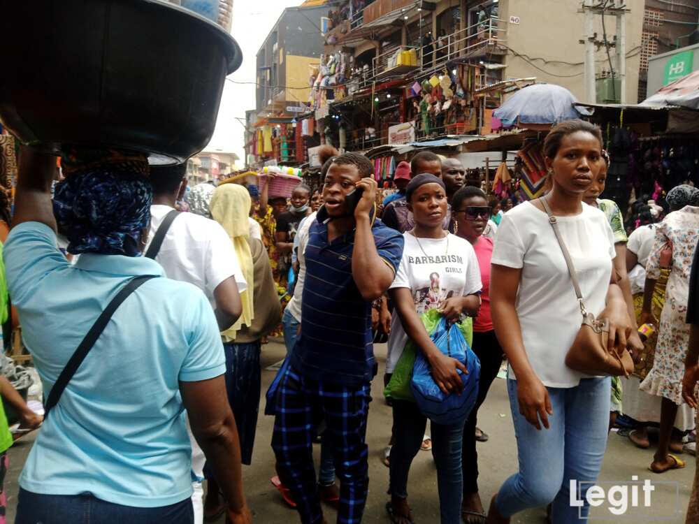 A street hawker at Balogun market, Balogun, Lagos. Photo credit: Esther Odili