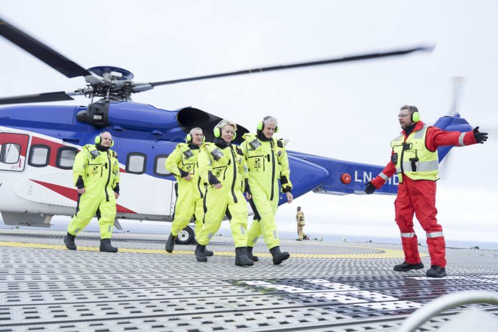 From left to right, chief Anders Opedal, NATO Secretary General Jens Stoltenberg, European Commission President Ursula von der Leyen and Norwegian Prime Minister Jonas Gahr Store visit a North Sea platform that provides 10 percent of Europe's gas needs