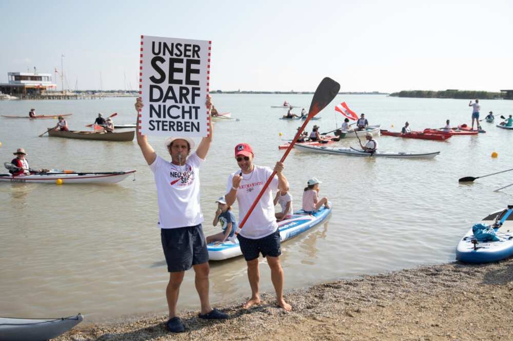 Last month over 100 people staged a rally to sound the alarm, some holding posters reading, 'Our lake must not die.' Last month over 100 people staged a rally to sound the alarm, some holding posters reading, 'Our lake must not die.'